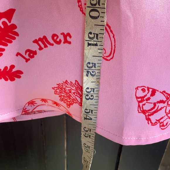 Never Fully Dressed
Pink La Mer May Midi Dress Size 14. - Picture 15 of 16